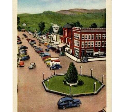 Downtown Murphy may be about to return to the roundabout scene shown on this antique postcard.