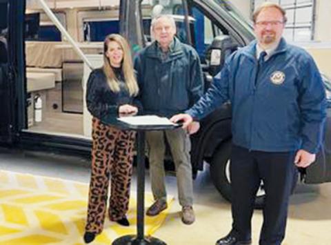 U.S. Rep. Chuck Edwards (R-N.C., right) poses with his staff in front of Carolina Cruiser, the N.C. 11th Congressional District mobile office.