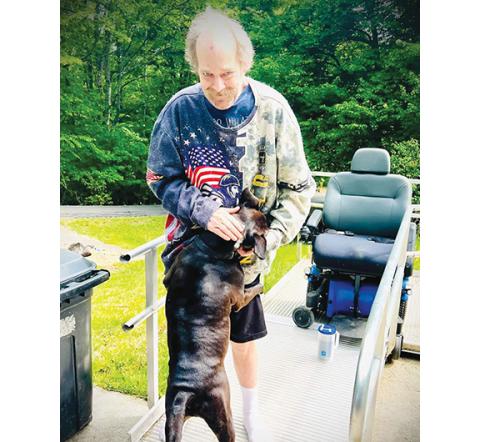 Lee Fischer with his beloved best friend and service dog, Dutch.
