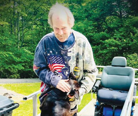 Lee Fischer with his beloved best friend and service dog, Dutch.