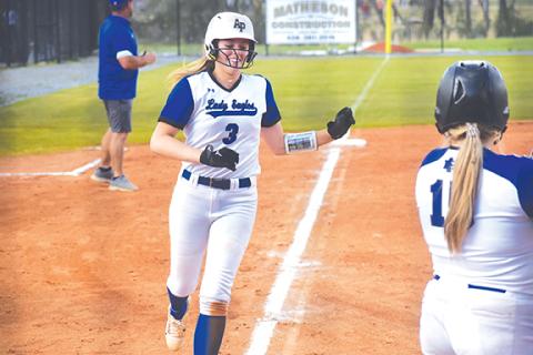 Justin Fitzgerald/sports@cherokeescout.com Hiwassee Dam’s Olivia McNabb was all smiles after rounding the bases following her two-run homer in the Lady Eagles’ 12-1 win over Hayesville on April 4.