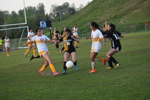 Justin Fitzgerald/sports@cherokeescout.com Murphy’s Carlee Catuto fights for the ball during the Lady Bulldogs’ 1-0 loss to Cherokee on April 20.
