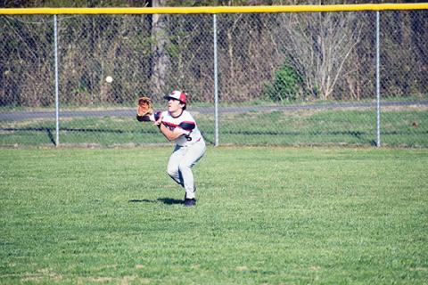 Justin Fitzgerald/sports@cherokeescout.com Andrews Eli Aguilar tracks the ball into his glove during the Wildcats’ 17-7 loss to Hiwassee Dam on Thursday.