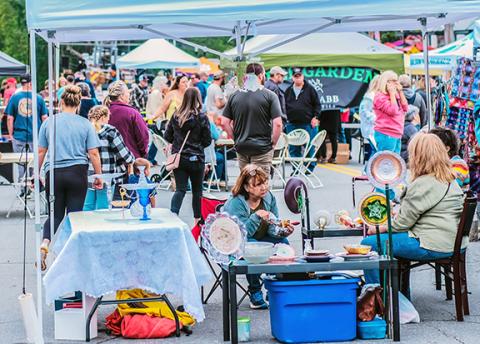 Photos by Sam Jokich/Staff Correspondent The First Friday Art Walk on May 5 and the annual Spring Festival on May 6 brought colorful crowds to downtown Murphy for food and fun.