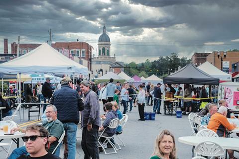 Sam Jokich/Staff Correspondent   Despite dreary gray skies, the Spring Festival in downtown Murphy was a hit and drew a large crowd Saturday.  