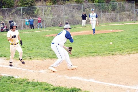 Justin Fitzgerald/sports@cherokeescout.com  Hiwassee Dam’s Colton Berrong readies to pick the ball out of the dirt during the Eagles’ 5-3 loss to Murphy on April 21. The Eagles’ season came to an end with an 11-1 loss to Hayesville in the first round of the state playoffs May 9.