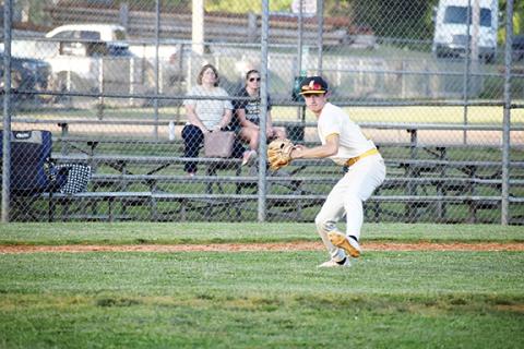 Justin Fitzgerald/sports@cherokeescout.com Murphy’s Isaac Cole gets ready to throw the ball to first base during the Bulldogs’ 17-11 loss to Bishop McGuinness in the first round of the state playoffs May 9.