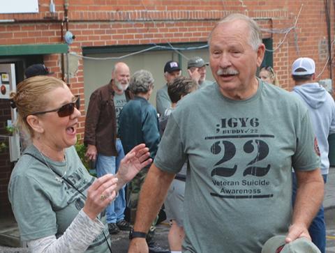 Abigail Blythe Batton/Staff Correspondent   Lorrie Rooney, 22 Hump director, and Gary Wilson, director of Warriors Veteran Outreach, capture the energy of their annual 22-mile, roundtrip trek from Murphy to Marble and back on an overcast day April 29. The walk represents the 22 U.S. military veterans who on average commit suicide each day.