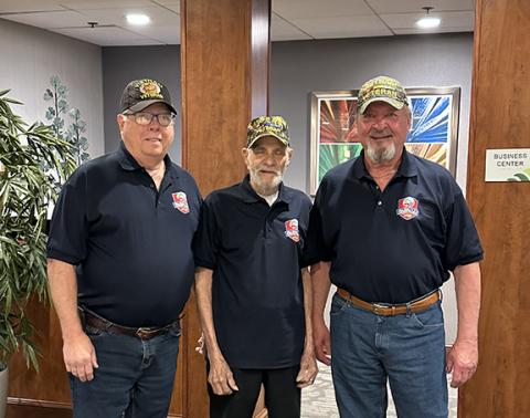 Bob Strawhecker, Oscar Valdes and J.D. Baker pose for a photo on April 29, when they participated in an Honor Flight tour of Washington.