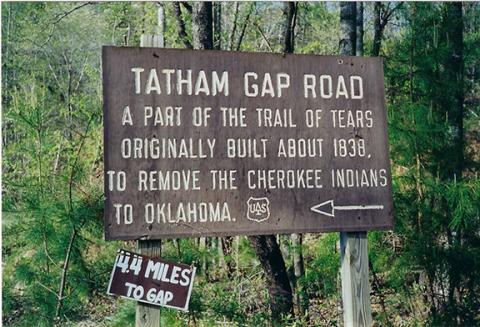 This sign stands on Tatham Gap Road as a reminder of the “Trail of Tears.” In 1838, the government began the Cherokee Indian Removal from Fort Montgomery in Robbinsville, across Tatham Gap to Fort Delaney in Andrews, to Fort Butler in Murphy. Then they marched the Cherokee to internment camps at Fort Cass in Tennessee to await deportation to Oklahoma. A sad period in U.S. history.