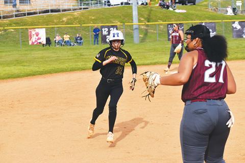 Justin Fitzgerald/sports@cherokeescout.com Murphy’s Julia Dockery sprints to third base during the Lady Bulldogs’ 8-4 win at Swain County on Thursday.