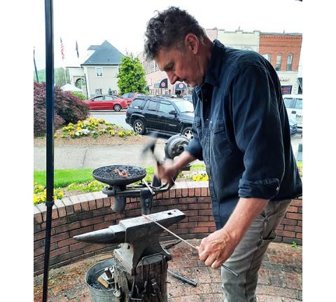 Paul Garrett drew interest in his craft as he was doing demonstrations on blacksmithing.