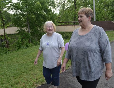 Abigail Blythe Batton/Staff Correspondent Joy Dockery and her best friend of 30 years, Cathy Huskins, came out to support Elder Abuse Awareness Day on Thursday night at the pavilion on Connahetta Street in Murphy. Dockery, who has walked for three years, said, “I don’t want to see the elders mistreated.”