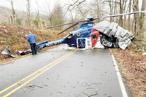 Photos taken by the Federal Aviation Administration show wreckage of LifeFlight 6 on March 10, the morning following the helicopter crash.