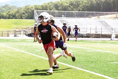 Photos by Justin Fitzgerald/sports@cherokeescout.com Andrews’ Eli Aguilar gets by a Union County defender during a 7-on-7 event Thursday.