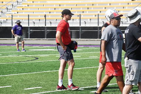 Justin Fitzgerald/sports@cherokeescout.com Andrews athletic trainer Coulter Clement observes his football team during a 7-on-7 scrimmage Thursday. After Harris Regional Hospital declined to renew their contract providing athletic trainers to Cherokee County Schools, the county voted to fund both positions.