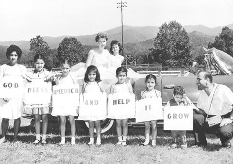 Joseph (Joe) El-Khouri’s entry in the Fourth of July parade in the summer of 1962 expressed how extremely proud he was to be a U.S. citizen. This photo includes five of the El-Khouri children and two of their cousins from Copperhill, Tenn.