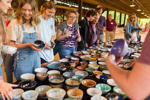 Selecting from the hundreds of beautiful bowls, all donated by local potters, is the hardest part of John C. Campbell Folk School’s annual Empty Bowls event.