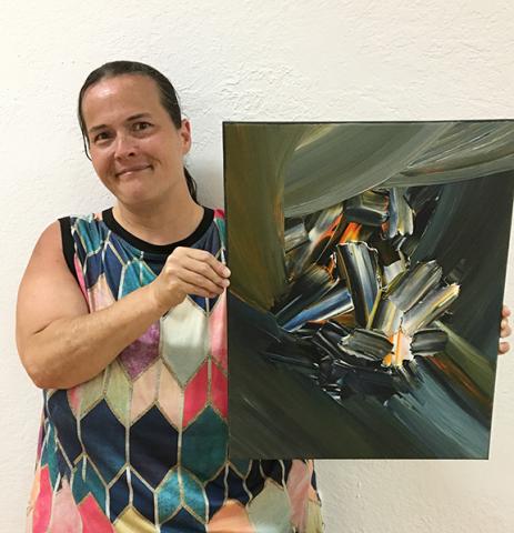 Sarah Worsham with a delightful abstract painting.