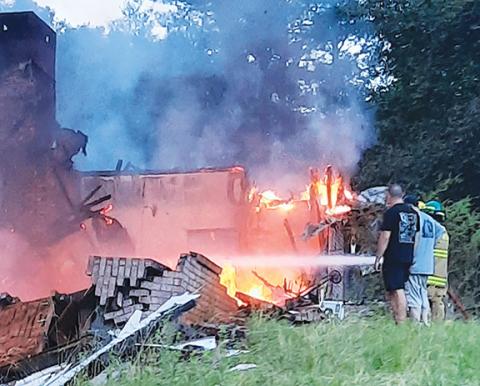 Anngee Quinones-Belian/Staff Correspondent  Fire destroyed a home in Ranger on Friday, requiring additional call backs. The cause is still under investigation.