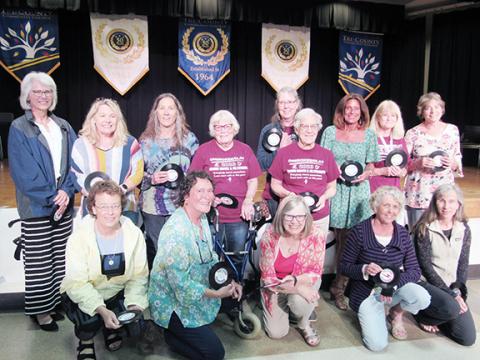 This year’s female record breakers are (front row, from left) Amanda Burts, Debra Bolle, Ruth Harrell, Laura Primer, Beth Taylor; (back row, from left) Susan Bekken, Christine Callihan, Jill Dash, Ruth Griffing, Jackie Olenik, Janet Paul, Michele Preisser, Debbie Swanson (receiving award for Marjorie Swanson) and Patty Singer. Not pictured are Lisa Sellers, Glenda Johnson, Mary Mott, Shelley Adair, Pat Lambert, Mary Flannigan and Mary Walsh.