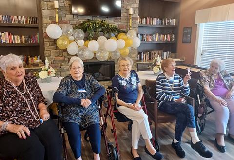 Abigail Blythe Batton/Staff Correspondent Mary Frances Clayton, Renate Wocell, Dorothy Graczyk, Delores Maresca, and Jackye Prine prepare to receive their free state-of-the-art radios from WCNG/WCVP.
