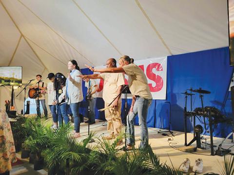 Rachelle Castellana/Contributing Photographer  The local Mountain Fires worship team is helping anyone desiring to come to Jesus Christ. They will be under The Worship Tent in Andrews through Saturday.