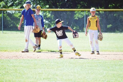 Photos by Justin Fitzgerald/ sports@cherokeescout.com Murphy High School baseball held a youth camp from July 10-12 at Konehete Veterans Park. Campers got instruction from current team coaches as well as players past and present. Connor Williams fires the ball to second base at a scrimmage during Murphy’s baseball camp on July 12.