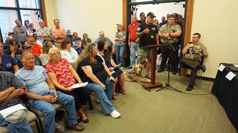 Randy Foster/editor@cherokeescout.com A standing-room-only crowd attended the Cherokee County Board of Commissioners meeting on July 17, including 15 people who signed up to talk about a proposed animal control ordinance.