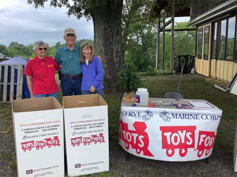 Sarah Thomas/Contributing Photographer Toys for Tots volunteers Gwen Hathaway, Don and Pattie Reynolds enjoy the fundraiser at the Nottely River Valley Vineyards on June 24