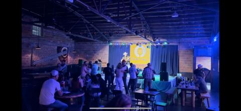 Abigail Blythe Batton/Staff Correspondent Locals and visitors alike enjoy a night at The Blue Stage on Main Street in downtown Andrews, host of “Andrews Idol” starting this month.