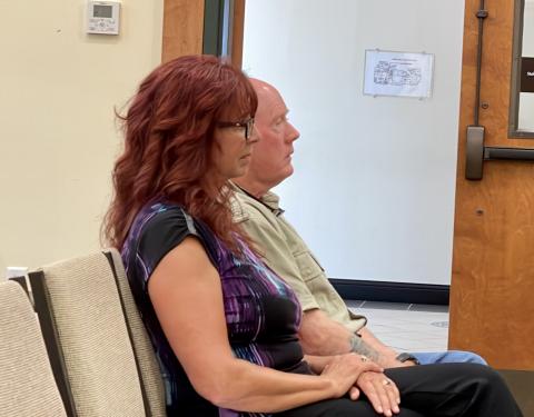 Cherokee County Commissioner Jan Griggs and her husband Joe attend an appeal hearing in Murphy on July 26.