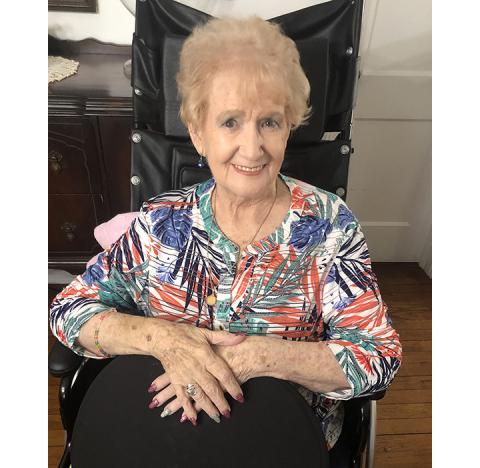 Abigail Blythe Batton/ Staff Correspondent Founder Joy Lynn sits in her dining room headquarters for Moore House Ministries in Murphy.