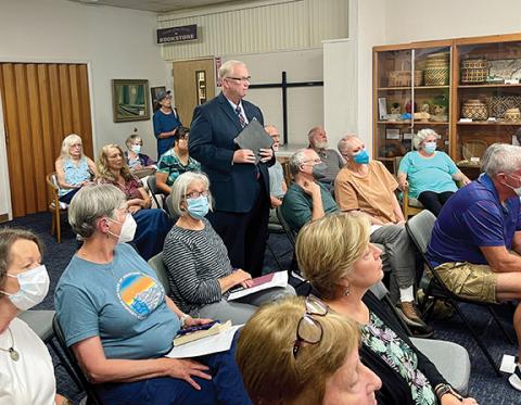 The Rev. Jimmy Tanner of First Baptist Church of Murphy speaks during a Nantahala Regional Library Board of Trustees meeting on Aug. 17, saying children already were being surgically mutilated inside the womb through abortion, and now they are outside the womb with gender reassignment surgery.