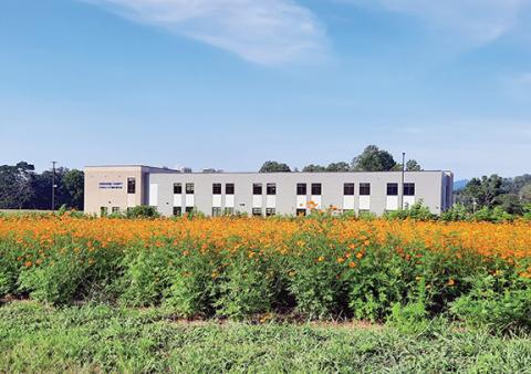 Bill Belian/Contributing Photographer  The new Cherokee County Schools of Innovation & Technology in Peachtree is big, bright and offers lots of open spaces with window views. The front entrance of the building also overlooks beautiful orange wild flowers.