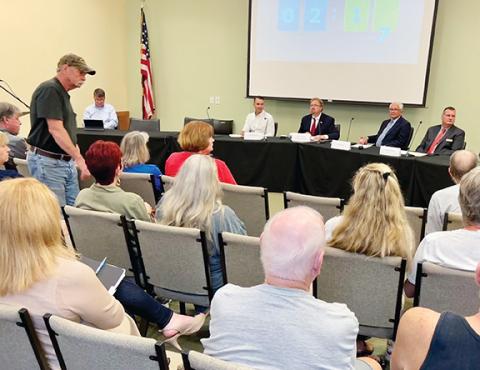 Randy Foster/editor@cherokeescout.com Seated at the table in front of an audience at the Cherokee County Courthouse on Aug. 24 were Aaron Melda, an engineer and senior TVA executive, U.S. Rep. Chuck Edwards, Cherokee County Commission Chairman Cal Stiles and Murphy Mayor Tim Radford (from left).