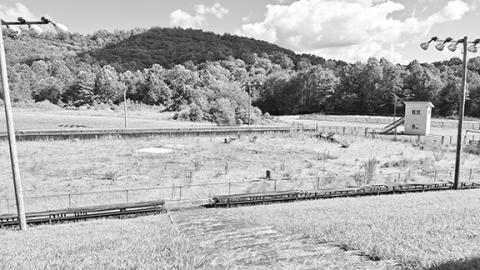 Anngee Quinones-Belian/Staff Correspondent  The sinkhole within the fenced area prevents the Cherokee County Saddle Club from using that space as a main competition arena.