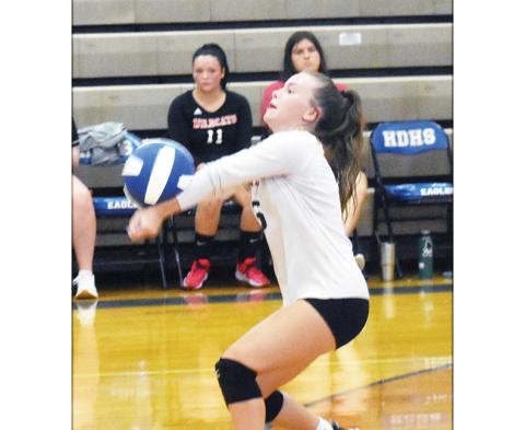 Justin Fitzgerald/sports@ cherokeescout.com Andrews Allie Gibson fights for a dig during the Lady Wildcats 3-2 loss to Hiwassee Dam on August 22.