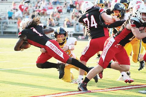Dawson Grizzle/Murphy Athletics Murphy’s Kadence Leatherwood wraps up Franklin’s Eli Brown during the Bulldogs 41-14 win over Franklin on Aug. 18.