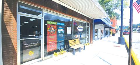 Nicole Wright/Staff Correspondent UPS is only coming to Valleytown three days per week, picking up packages at the Andrews Chamber of Commerce’s office on Main Street downtown.