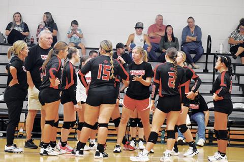 Justin Fitzgerald/sports@cherokeescout.com Andrews head coach Shanna Mustin addresses her team during the Lady Wildcats’ 3-0 loss at Robbinsville on Aug. 31.