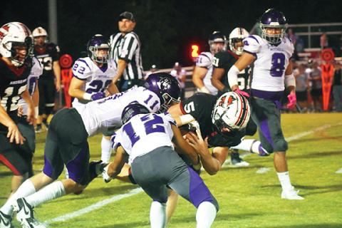 Justin Fitzgerald/sports@cherokeescout.com Andrews running back Dalton Rose readies for contact during the Wildcats’ 20-3 loss to Mitchell on Sept. 8. In a 28-0 win over the Hickory Hawks on Friday night, Rose ran for 144 yards and three touchdowns and wreaked havoc on the opposing defense.