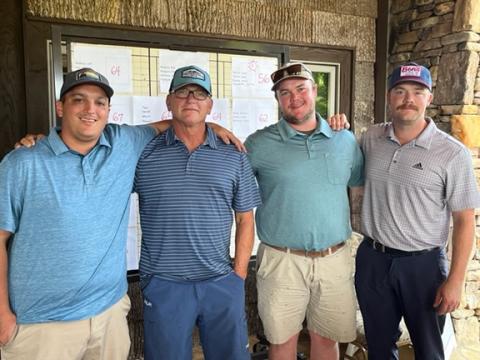 The winning foursome of (from left) Caleb Tallman, Scott Tallman, Justin Flanagan and Jacob Wallace each received gift certificates from Mountain Harbour Golf Club, Hinton Rural Life Center and The Copper Door restaurant.