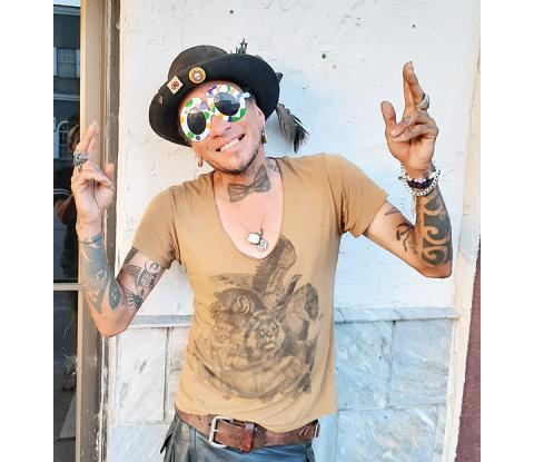 Anngee Quinones-Belian/Staff Correspondent  Victor Crespo often walks past businesses during his strolls in downtown Murphy. He is friendly, likable and an interesting soul. 