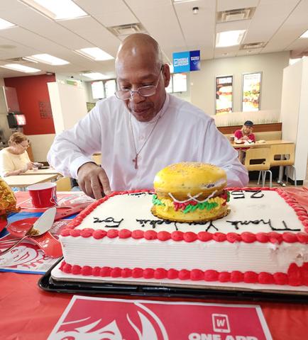Jackie Sullivan is celebrated with a cake and other gifts of thankfulness from Wendy’s restaurant in Murphy earlier this month. 