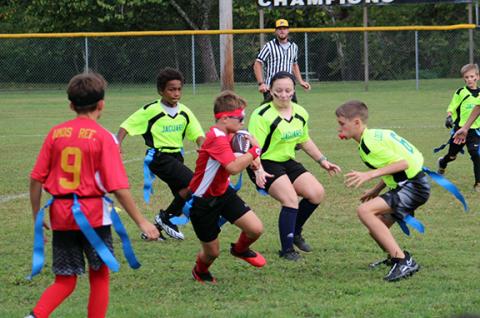 Flag football for ages 12 and under contains all of the game’s excitement, but with far less contact between players. 