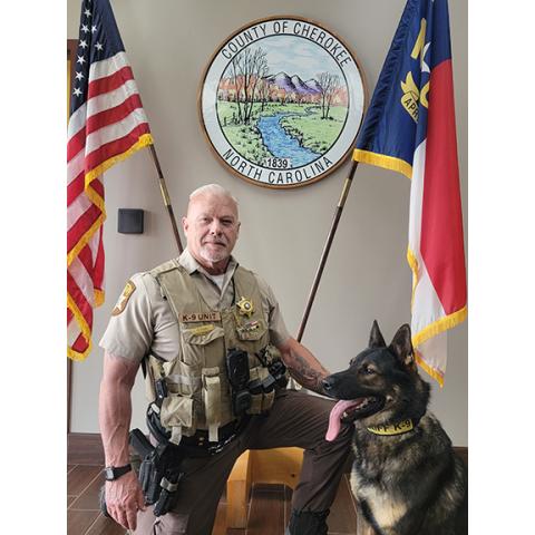Deputy Dennis Dore and his K-9, Epic, pose for a portrait at the Cherokee County Sheriff’s Office in this undated photo. The team is considered the “gold standard.”