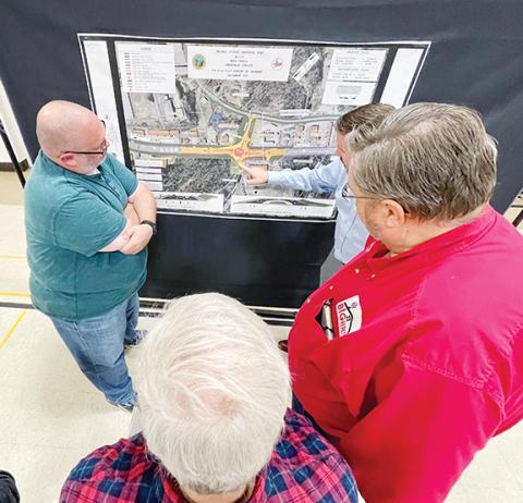 Randy Foster/editor@cherokeescout.com N.C. Department of Transportation officials explain a planned roundabout project during an informational meeting at Tri-County Community College on Oct. 10.
