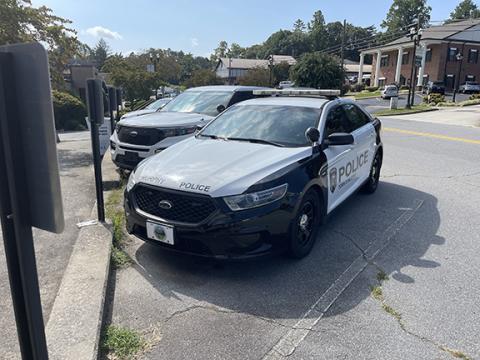 Randy Foster/editor@cherokeescout.com Police cars are parked outside the Murphy Police Department on a recent morning. Town officers are allowed to take their patrol cars home, one of many perks offered.