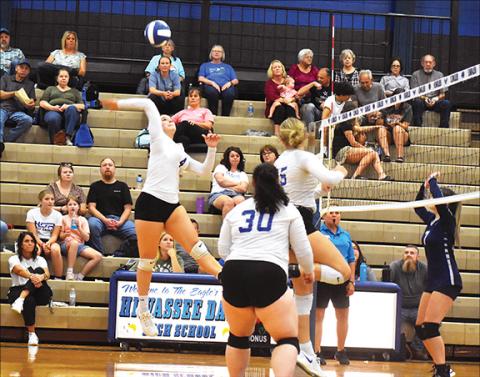 Justin Fitzgerald/sports@cherokeescout.com Hiwassee Dam’s Brinkley Payne tries to hit the ball over the net during the Lady Eagles’ 3-0 win over Nantahala on Thursday.